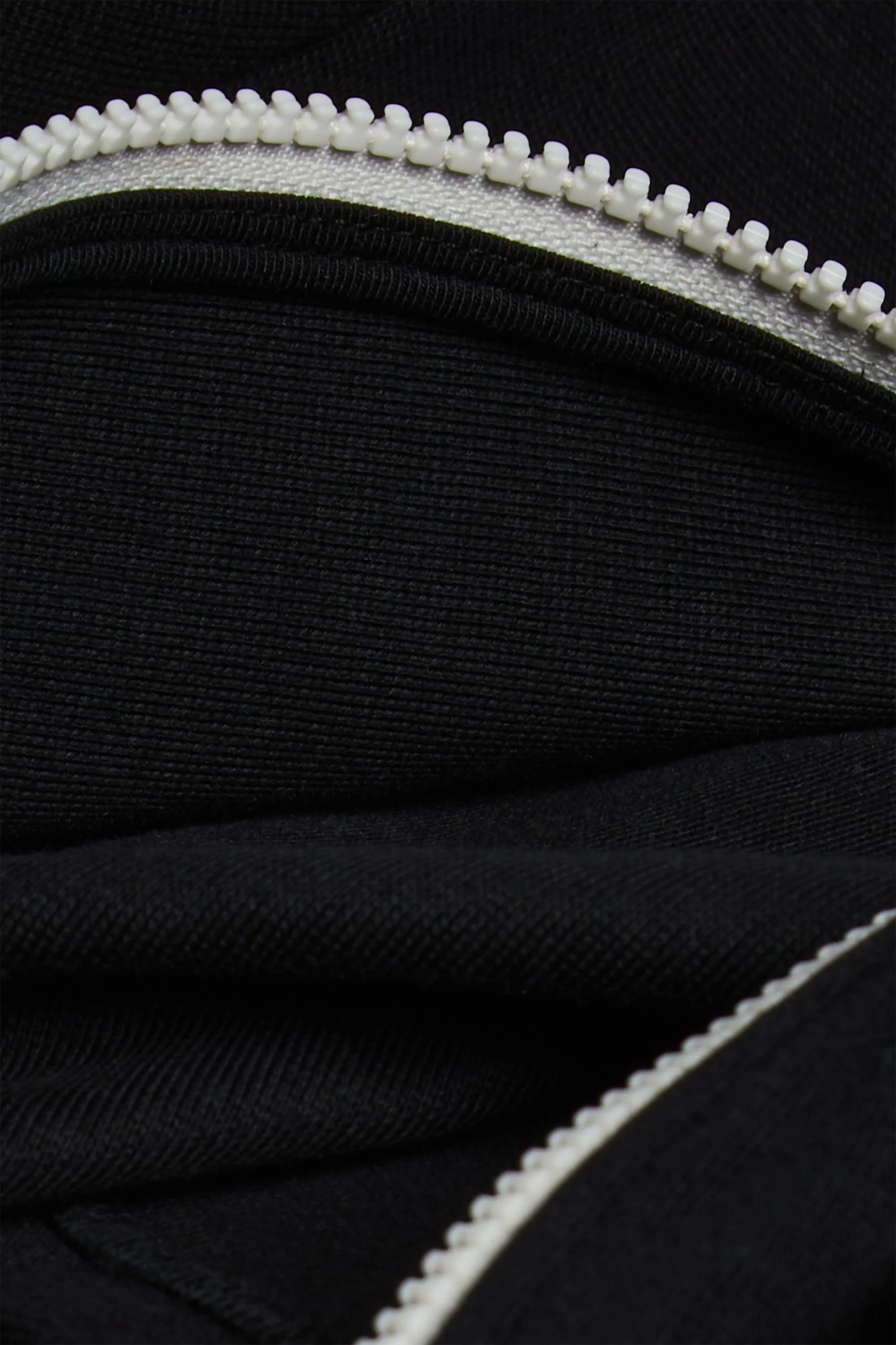 HIGH NECKLINE ZIP-UP TOP