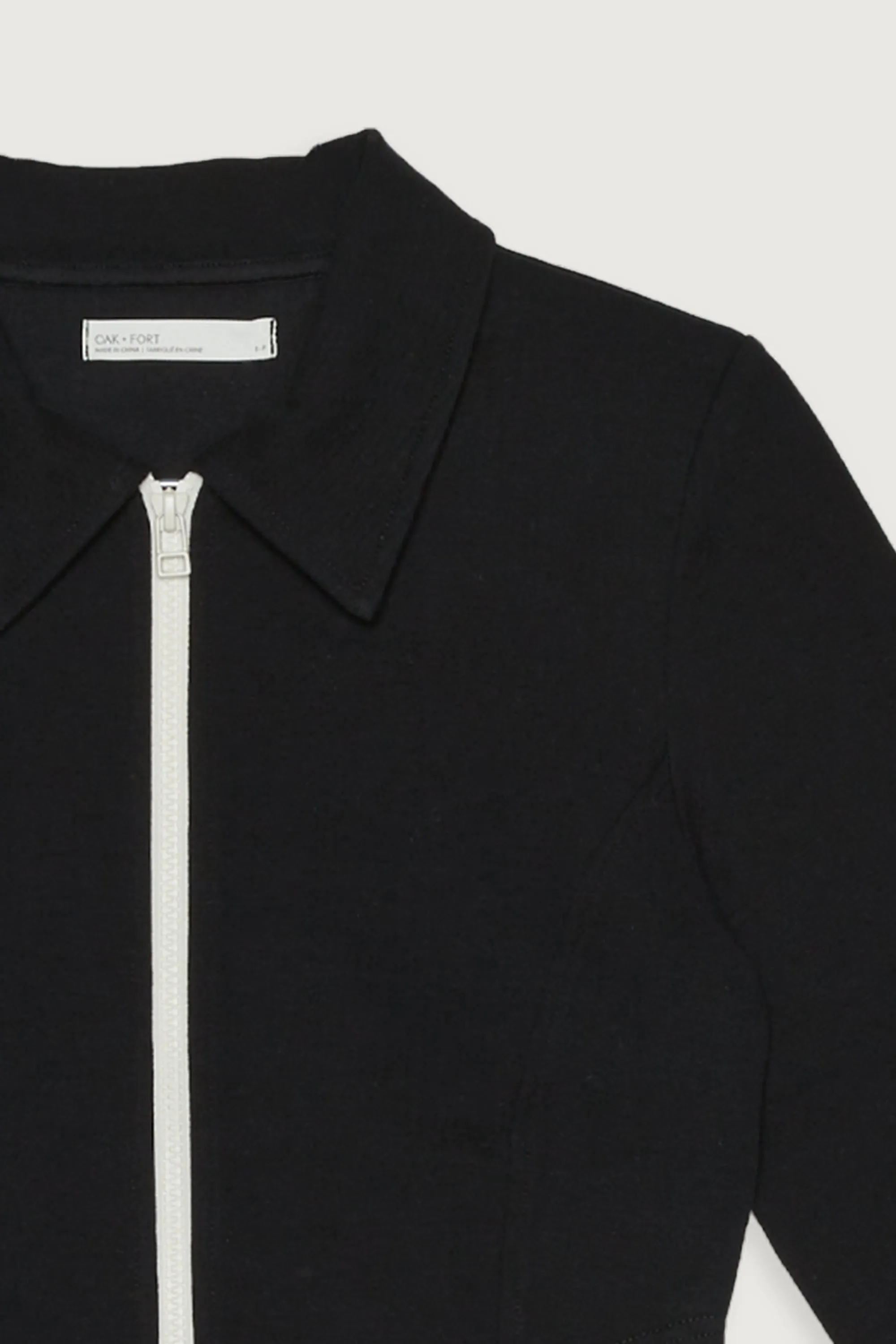 HIGH NECKLINE ZIP-UP TOP