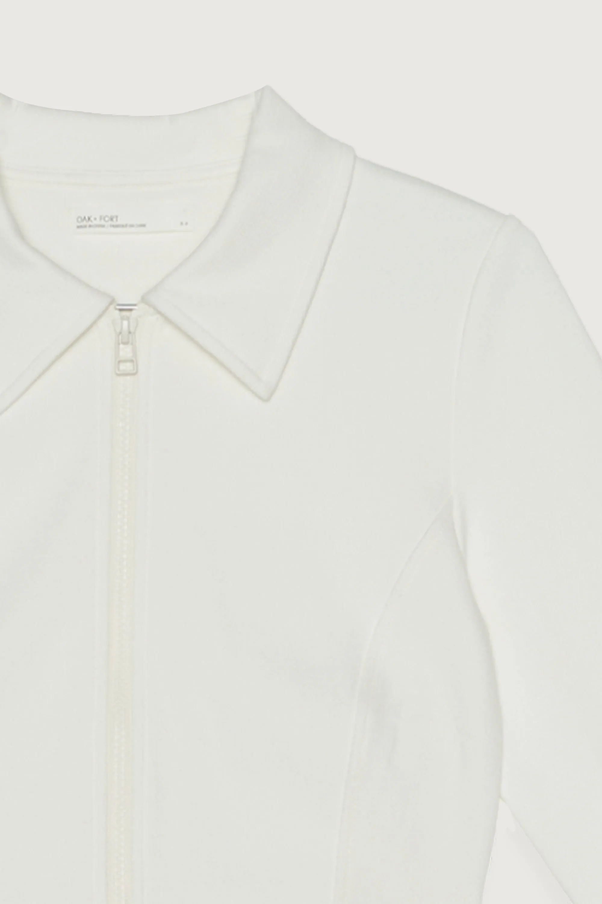HIGH NECKLINE ZIP-UP TOP